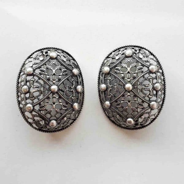 Viking brooches with open design in aged silver colour