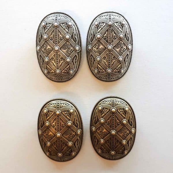 Viking brooches with shield design
