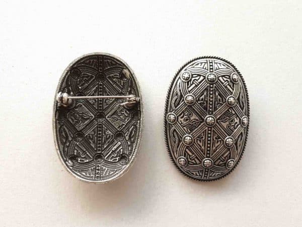 Viking brooches with shield design back view