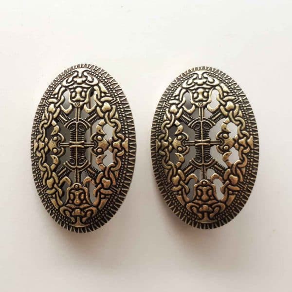 A set of viking brooches with talisman design in aged bronze