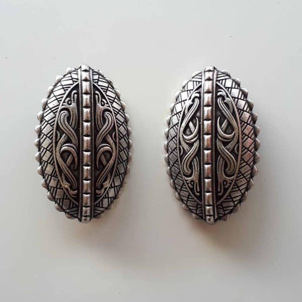 Viking brooches with dragons in aged silver