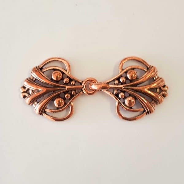 Strong Elvish cloak clasp in aged copper